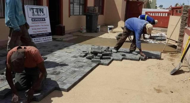 TTN team laying interlock paving
